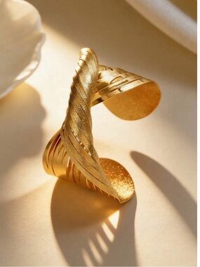 Gold Twisted Ribbon Cuff Bracelet